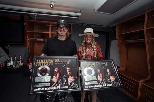 Platinum Surprise: HARDY and Lainey Wilson Receive Plaque For ‘Wait in the Truck’ Ahead Of Tour Kickoff