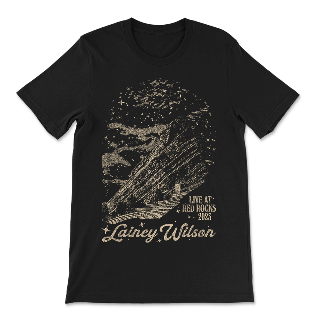 Black t-shirt with a metallic graphic design featuring Red Rocks amphitheater and ’Lainey Wilson Live at Red Rocks 2023’ text.