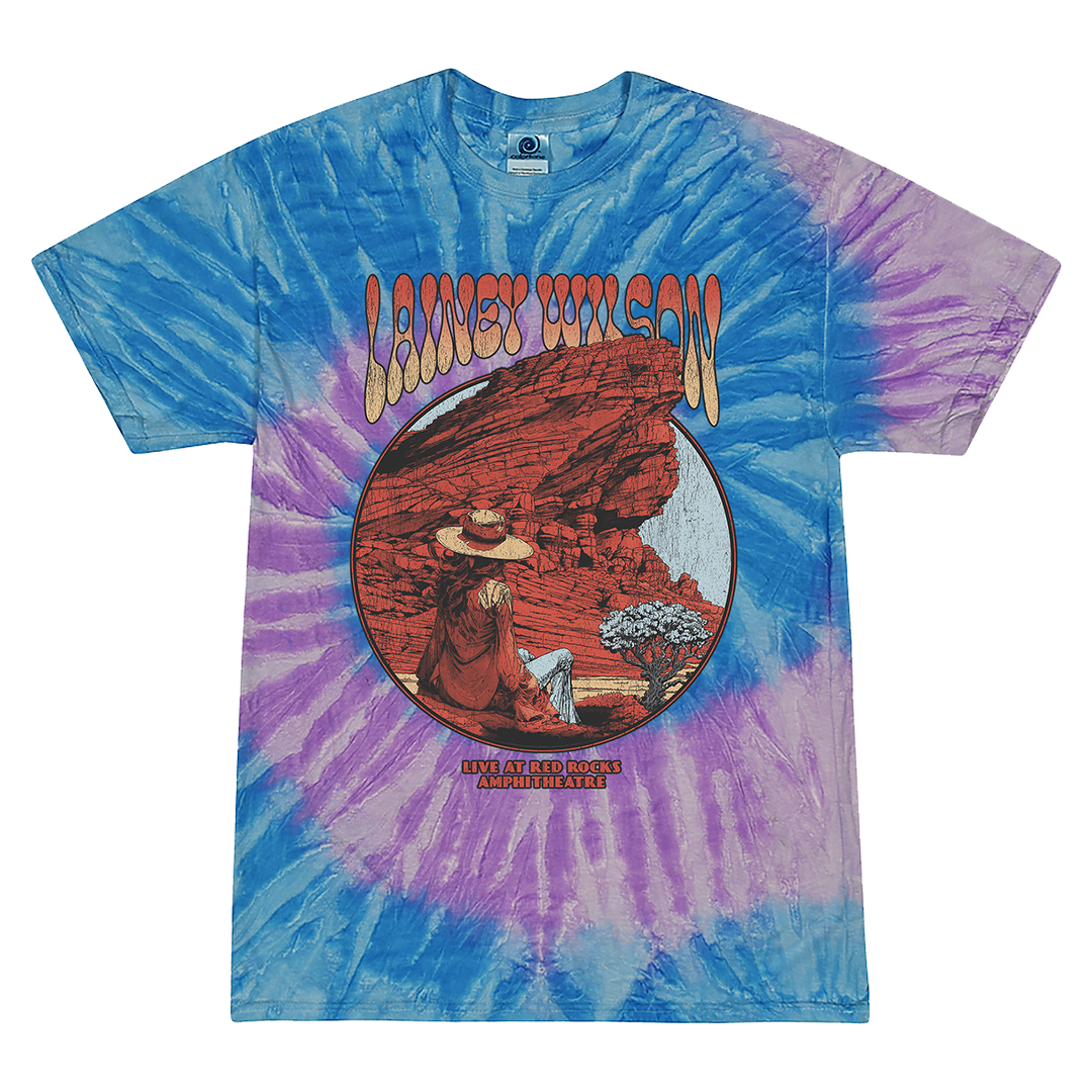 Tie-dye t-shirt featuring a Lainey Wilson concert design with a desert landscape image.
