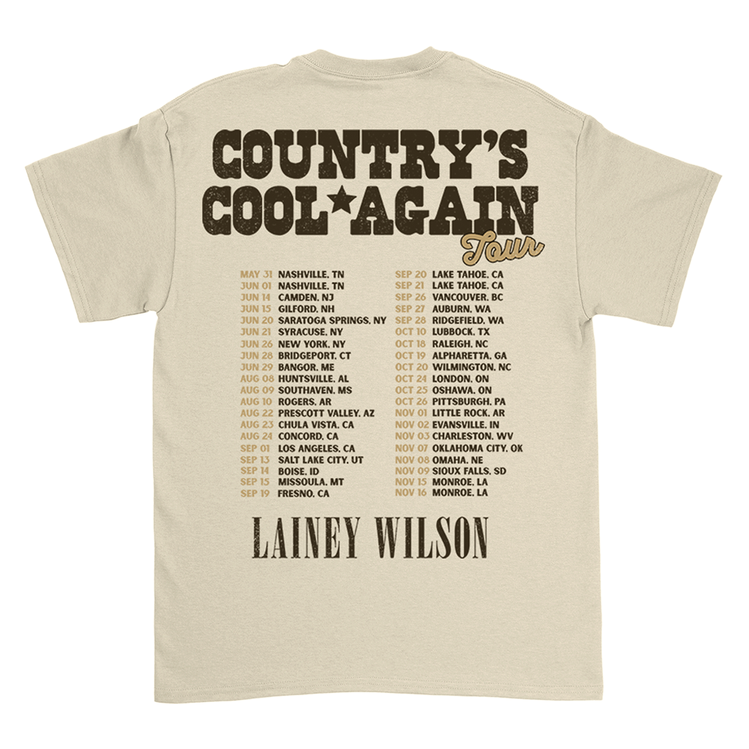 Beige t-shirt displaying tour dates for a ’Country’s Cool Again Tour’ by Lainey Wilson.