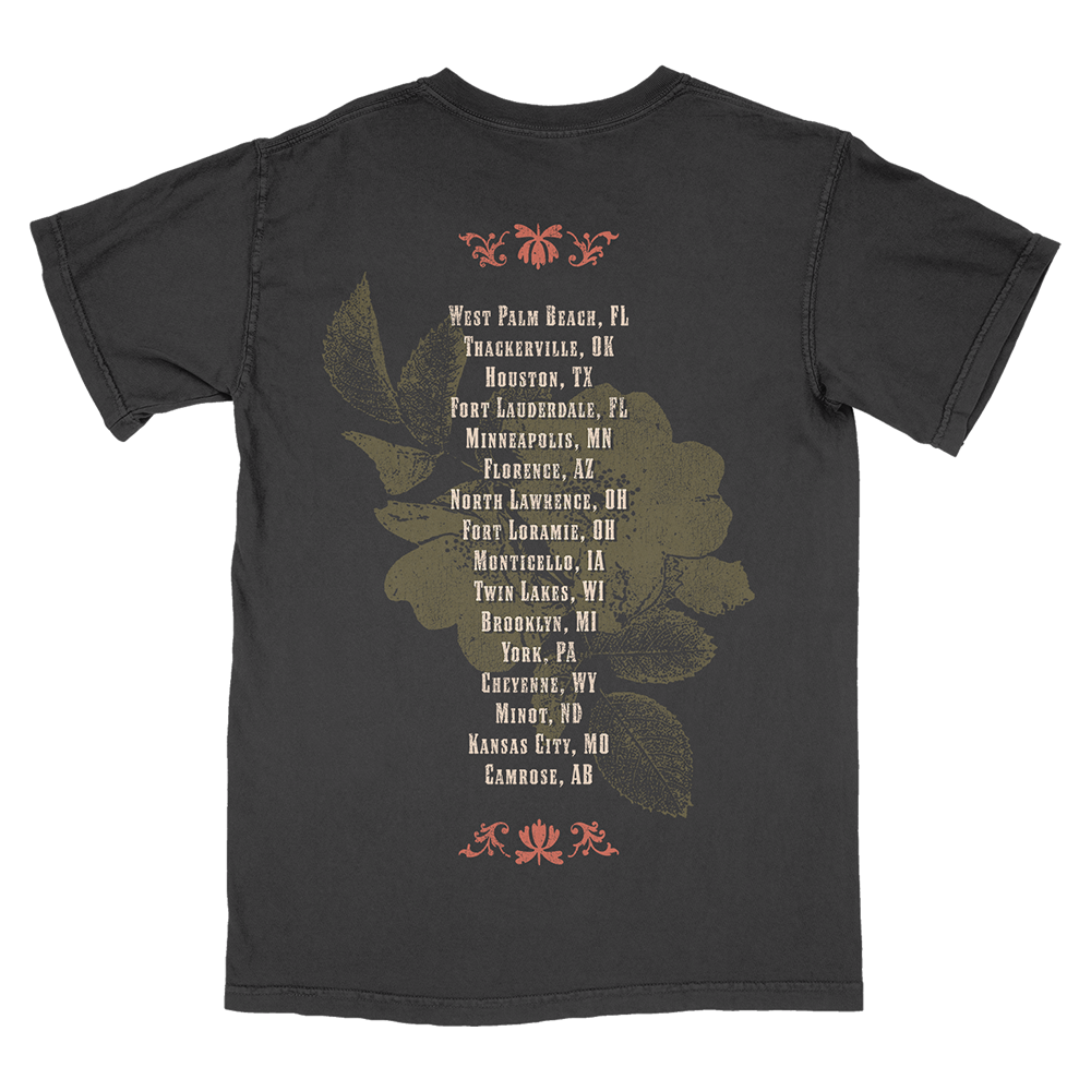 Black t-shirt with a list of city names printed on the back.