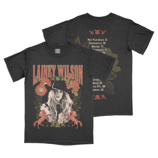 Black t-shirt with Lainey Wilson tour merchandise design featuring her image and tour dates.