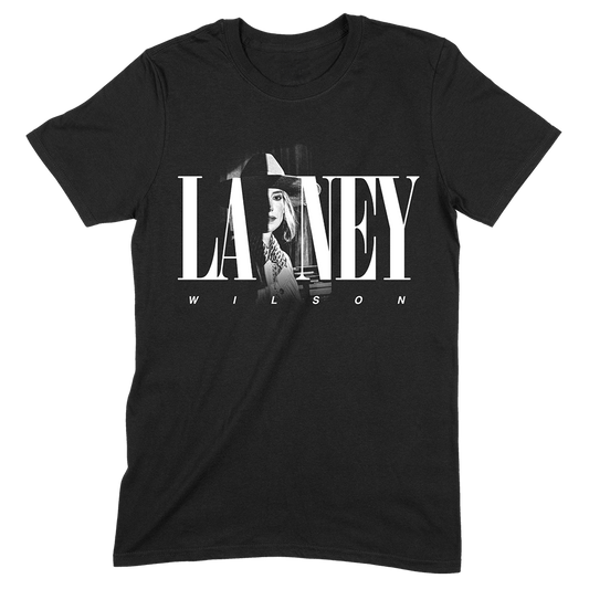 Official Lainey Wilson Merchandise. Black, 100% cotton unisex semi fitted t-shirt featuring a black white logo photo of Lainey.