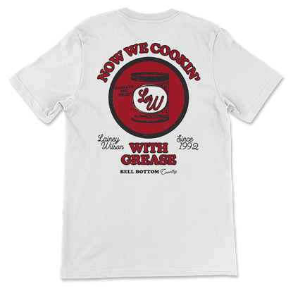White t-shirt with a red and black graphic design on the back featuring text and a circular logo.