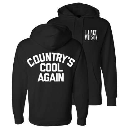 Black hoodie sweatshirt with ’Country’s Cool Again’ printed on the back and ’Lainey Wilson’ on the front.