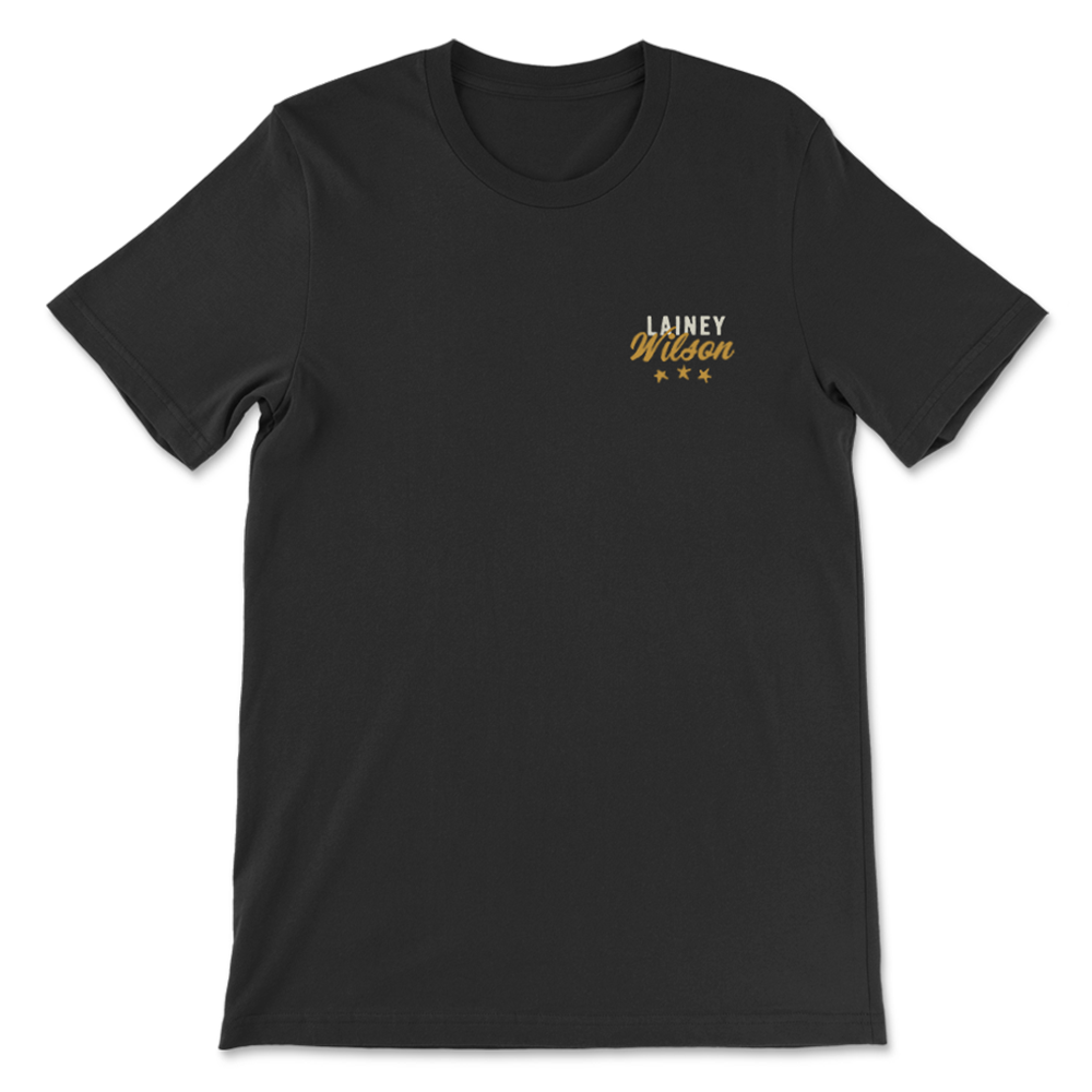 Black t-shirt with ’Lainey Wilson’ and three stars printed on the chest in gold lettering.