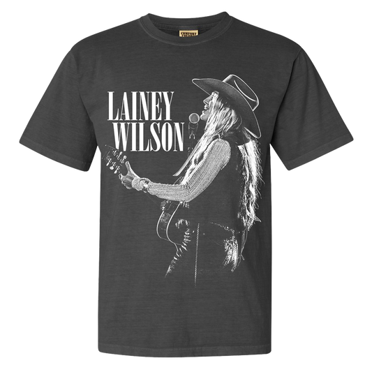Official Lainey Wilson Merchandise. Dark grey, 100% cotton heavy weight t-shirt with a black and white live photo of Lainey Wilson.